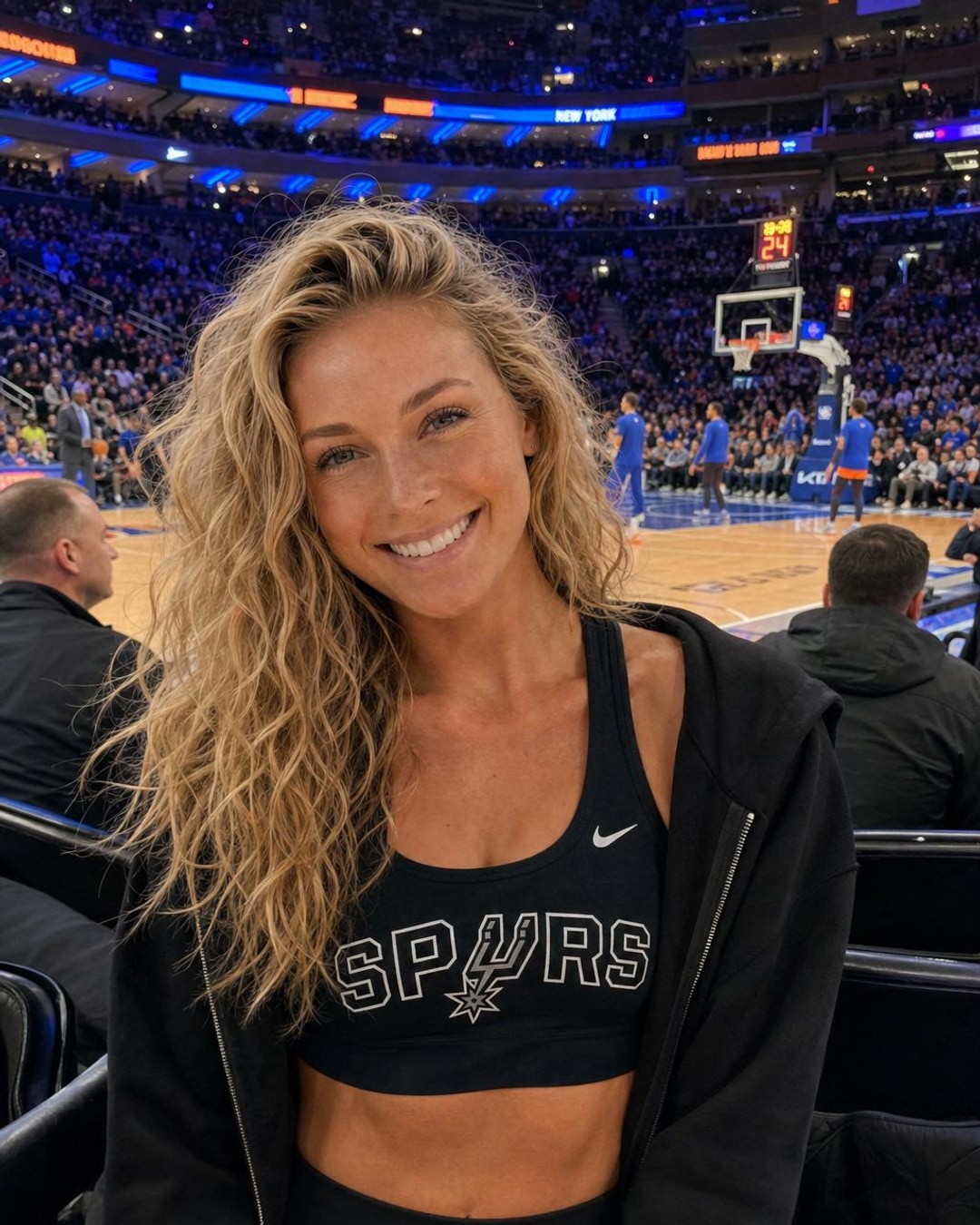 Emberly Everhart courtside at a basketball game